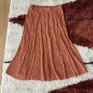 Kivari midi skirt. Orange with leopard spots. Size L